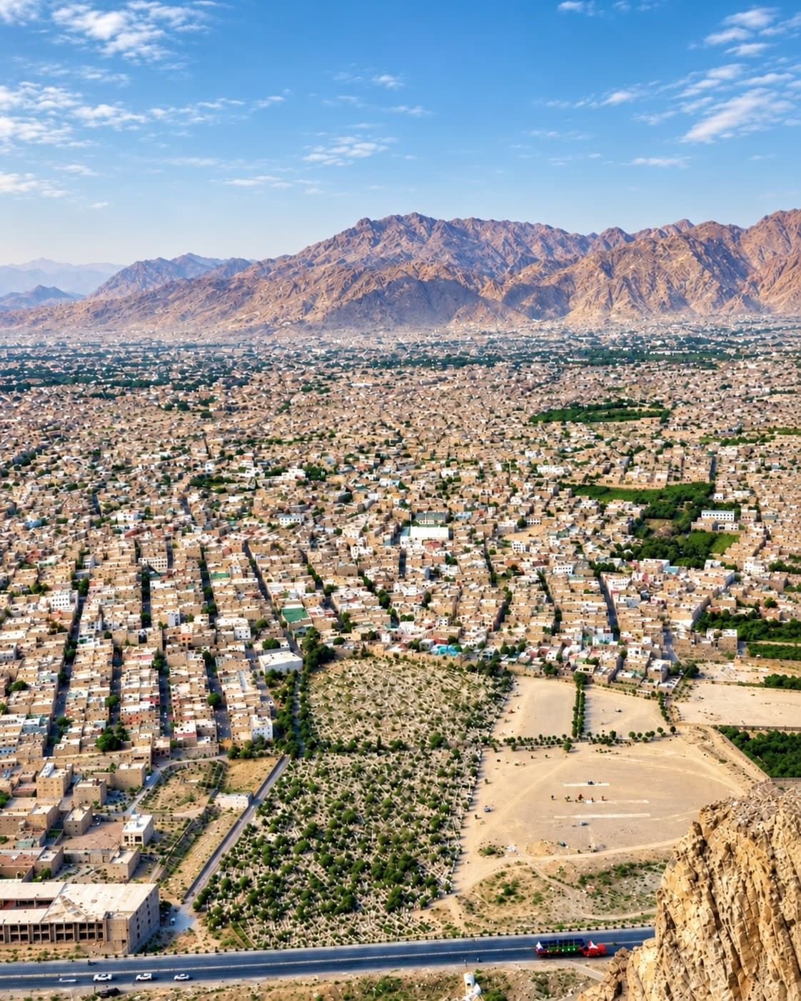Quetta city seen from above, with the mountains beyond
