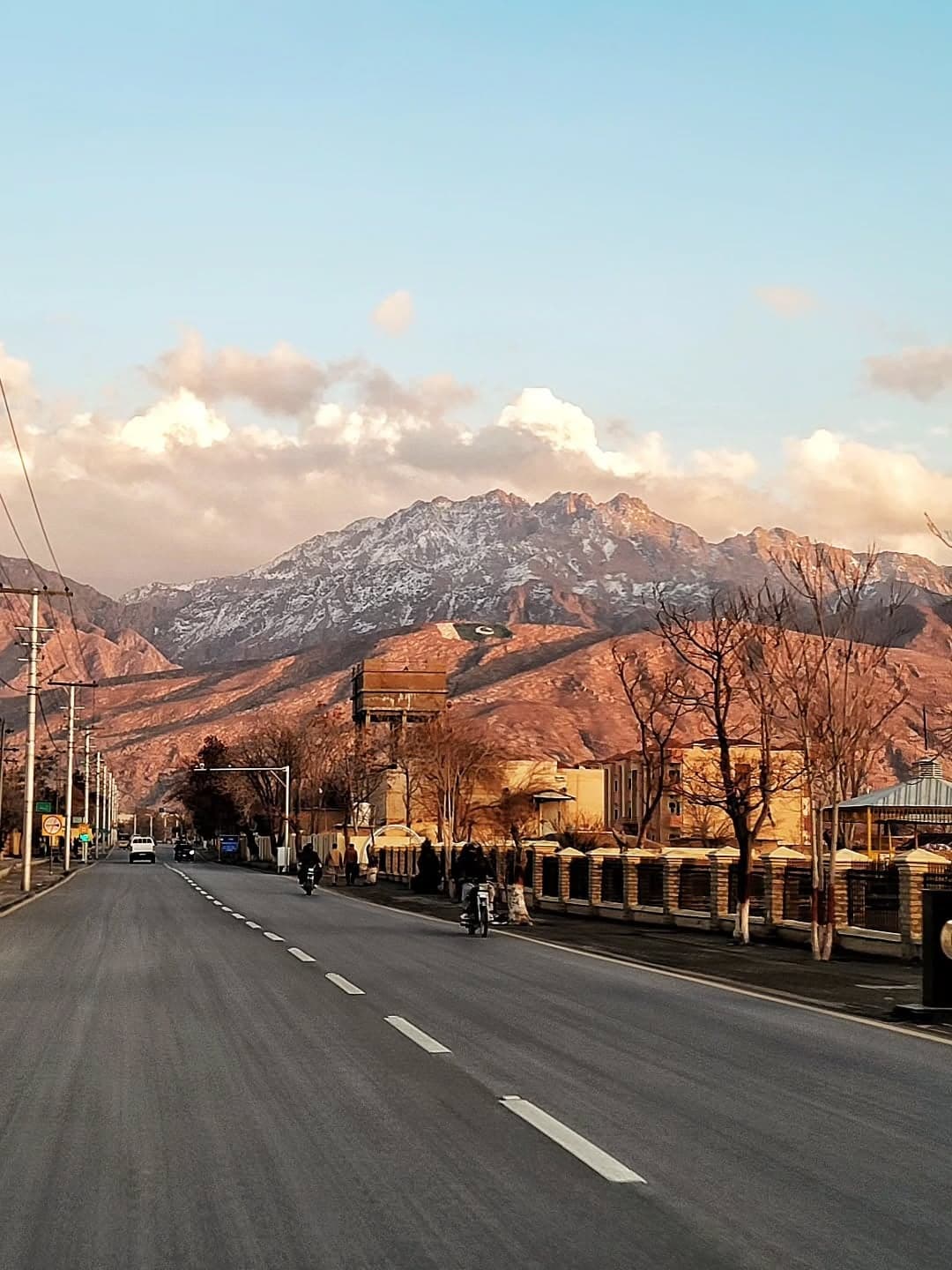 A road in Quetta Cantonment with the mountains behind at sunset